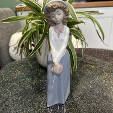 Nao Girl Holding Purse In