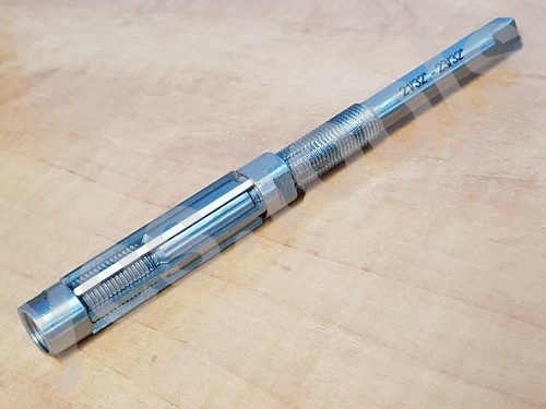 Adjustable expanding reamer - expanding,