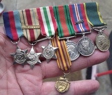 PERIOD WW2 MINIATURE SEVEN