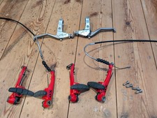 Red Shimano DX MTB V-Brakes with Avid Levers