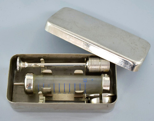 Antique ear syringe - ear,