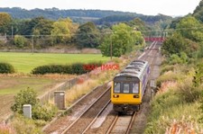 PHOTO  CLASS 142 NORTHERN CLASS 142 DIESEL UNIT 142068 PULLS AWAY FROM CORBRIDGE