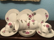 ￼Vintage Pink Rises Bone