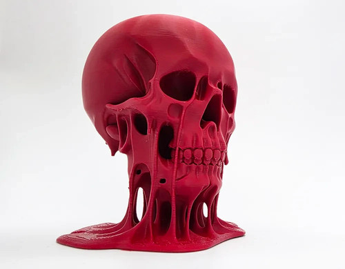Melting skull sculpture - skull,