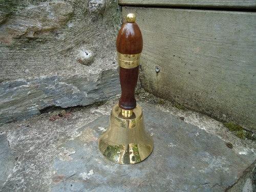 Brass hand bell wooden - hand,