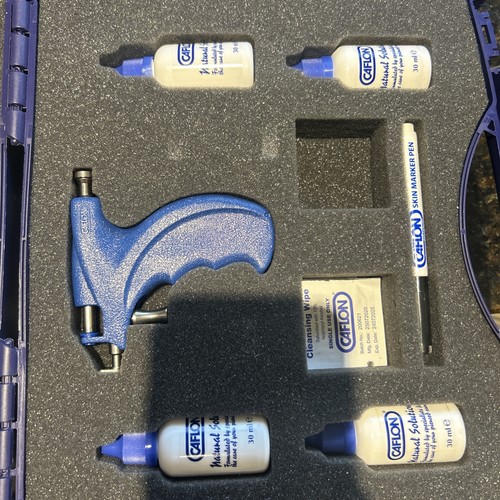 Caflon ear piercing gun - ear,