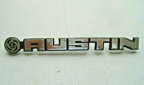 Old metal austin badge with - old,