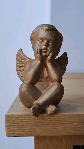 Gold plaster cherub seated - gold,