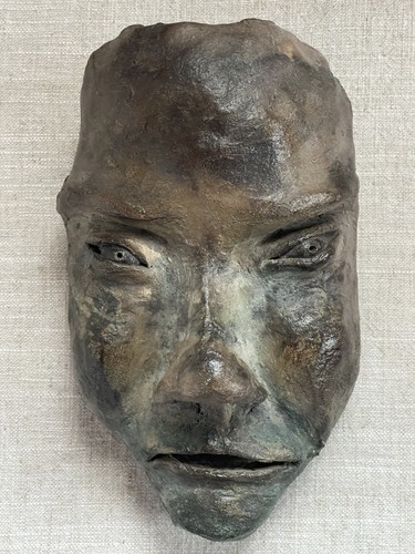 Death mask haunting curiosity - death,