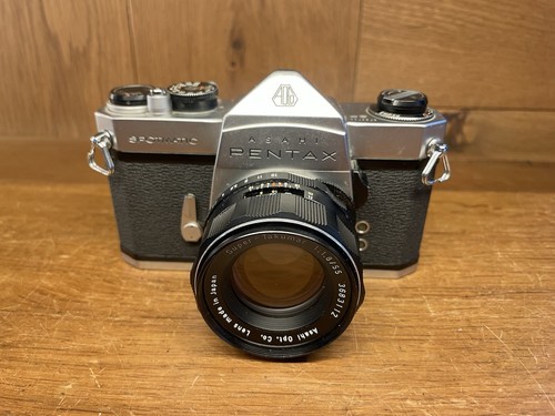 Read near mint pentax - :,
