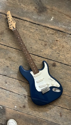 Electric guitar and amplifier - guitar,