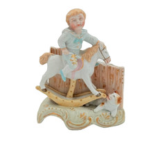 Antique bisque figurine boy on