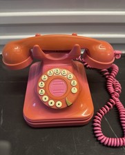 vintage orange rotary phone
