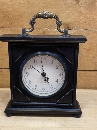 Black wooden mantel - , clock