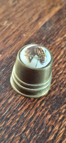 Vintage brass thimble with