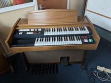 Lowrey Organ with Built-In Leslie Speaker.