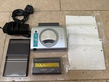 Canon SELPHY CP600 Compact Digital Photo Printer with supplies and cable