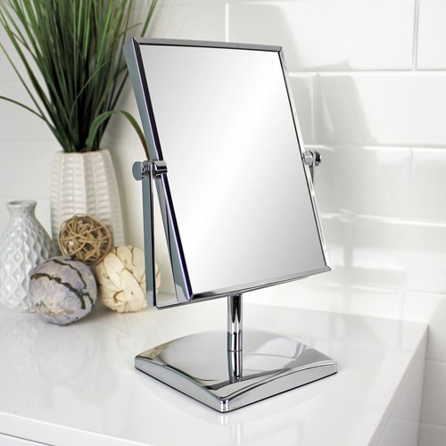 Dual sided magnifying make - magnifying,