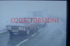 35mm Slide  1975 Mk 3 ford Cortina Towing Caravan Grindel Switzerland Agfa