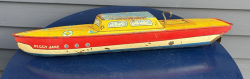 Vintage tin litho motor boat