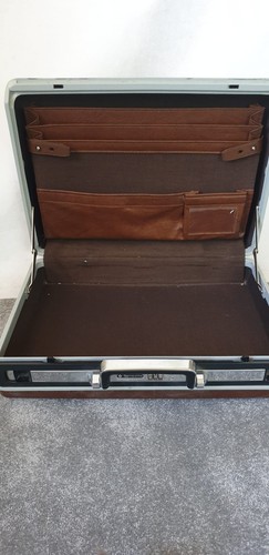 Brown tan samsonite - brown/,