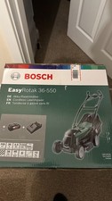  Bosch EasyRotak 36-550 lawnmower with charger and battery.