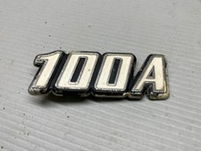CLASSIC  DATSUN  '' 100A ''    BADGE   78802 MO900