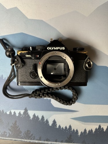 Olympus black 35mm slr - olympus,