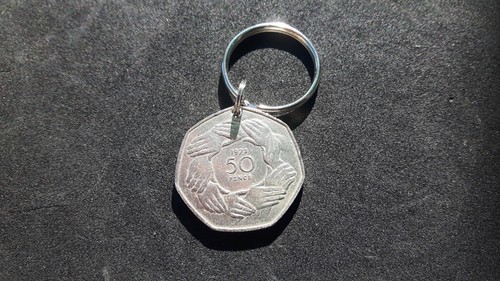 1973 old 50p hands - old,
