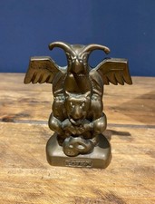 Heavy brass totem ornament, Figure