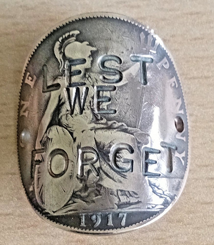 Walking stick badge lest we - 'lest,