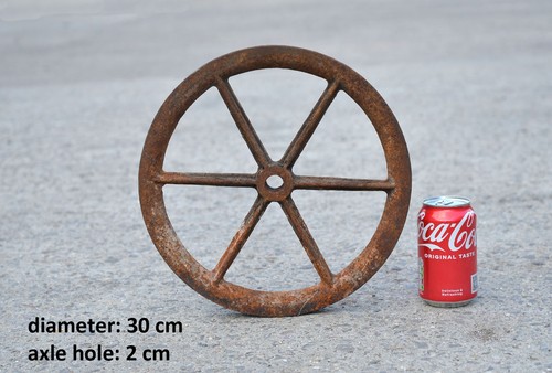Old vintage cast iron pulley - old,