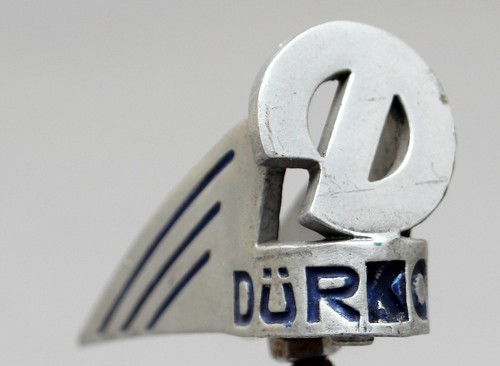 Old mudguard figure emblem