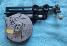 Radial arm return mechanism