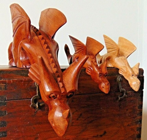 Carved wooden shelf sitting