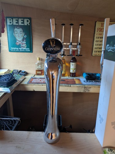 Guinness beer pump full - beer,