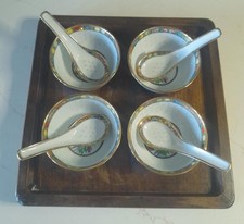Set of 4 vintage Chinese rice eye soup bowls and spoons.