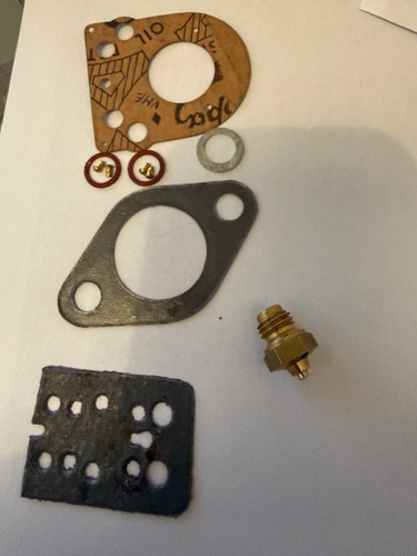 Gaskets and float needle - and,