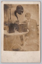 Man Tuning Early Radio