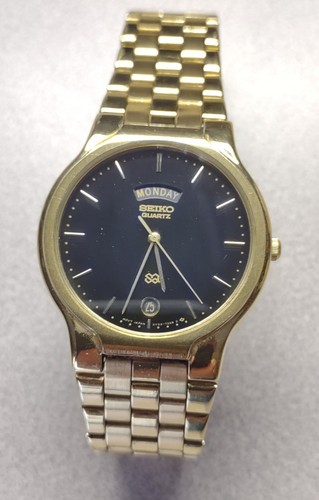 Seiko black dial quartz day - seiko,