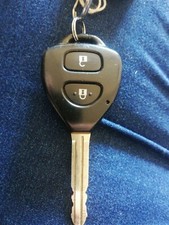 TOYOTA 2 BUTTON REMOTE CAR KEY FOB IN WORKING ORDER.
