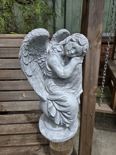 Latex and fibreglass angel - and,