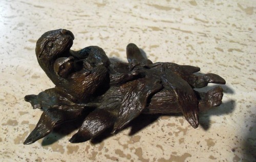Old bronze sculpture - old, otter