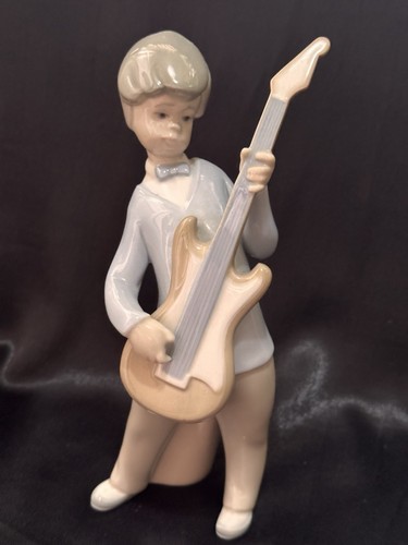 Lladro 4614 boy - boy, guitar