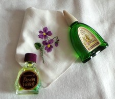 Two tiny perfume bottles Devon