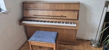 Upright Eavestaff Piano
