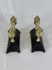 Pair of antique brass and cast iron fire dogs / stands for fireplace tools