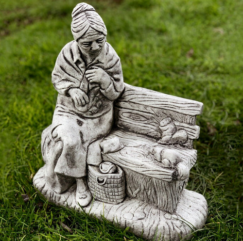 Grandma bench statue - a,