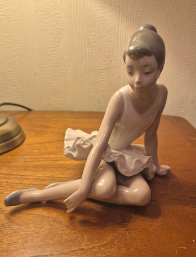 Vintage nao lladro seated - by,