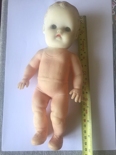 Vintage rubber roddy doll